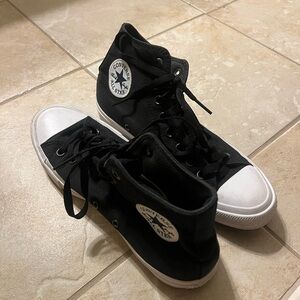 Black and white converse. Women’s size 10 and Men’s size 8.